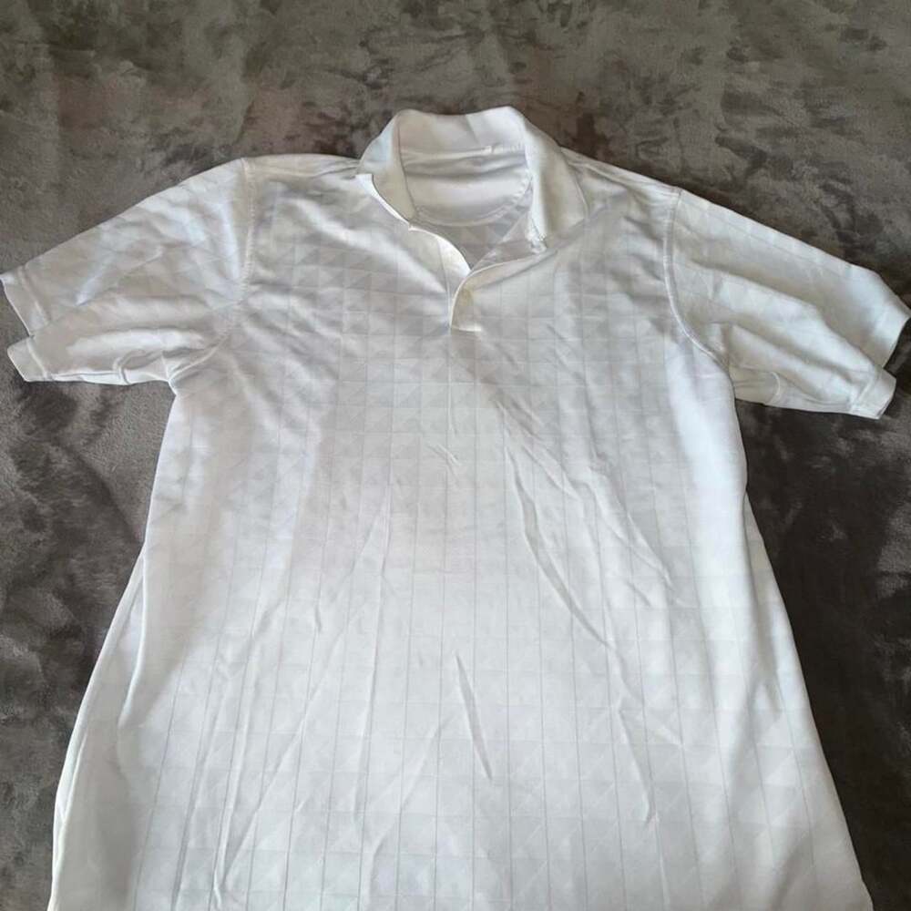 Adidas White Polo Shirt with Geometric Stripe Pattern